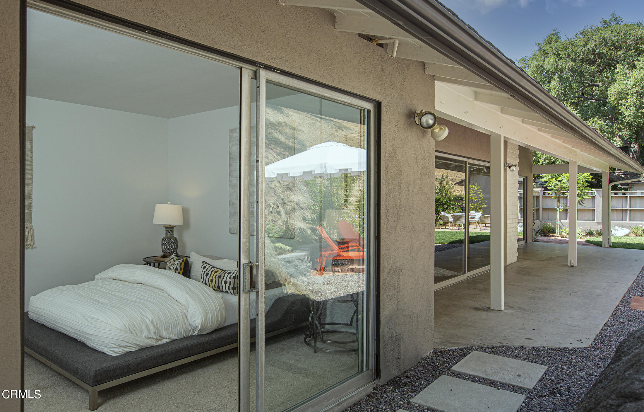 4175 Chevy Chase Drive La Canada Flintridge, CA 91011 - Photo 22 of 40 a bedroom with a bed and a large window