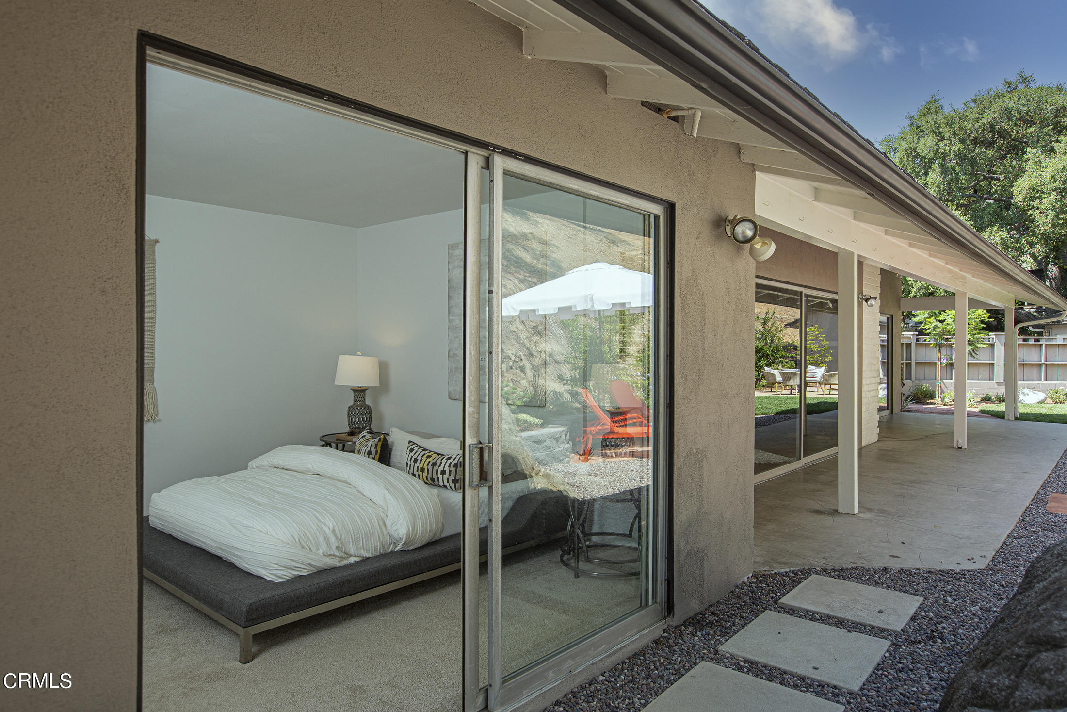 4175 Chevy Chase Drive La Canada Flintridge, CA 91011 - Photo 24 of 40 a bedroom with a bed and a window