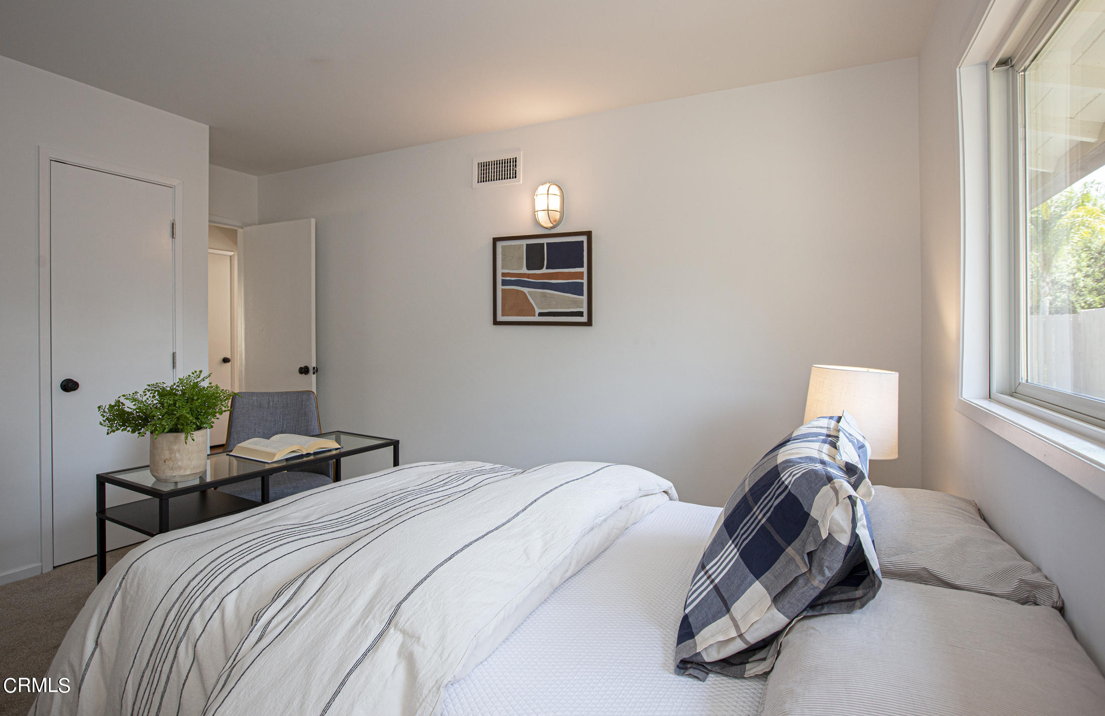 4175 Chevy Chase Drive La Canada Flintridge, CA 91011 - Photo 26 of 40 a bedroom with a bed and a window