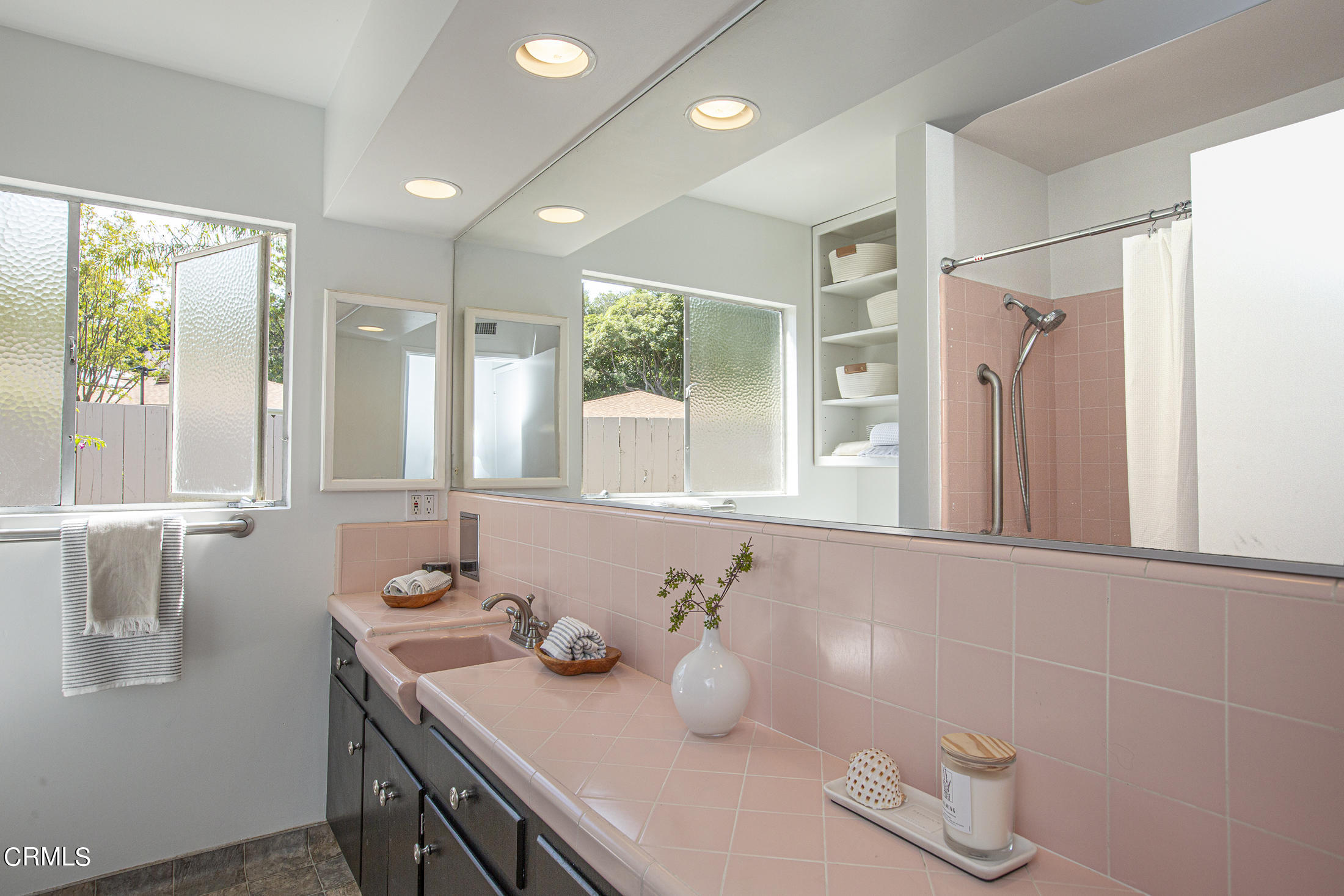 4175 Chevy Chase Drive La Canada Flintridge, CA 91011 - Photo 29 of 40 a bathroom with a granite countertop sink and a large mirror