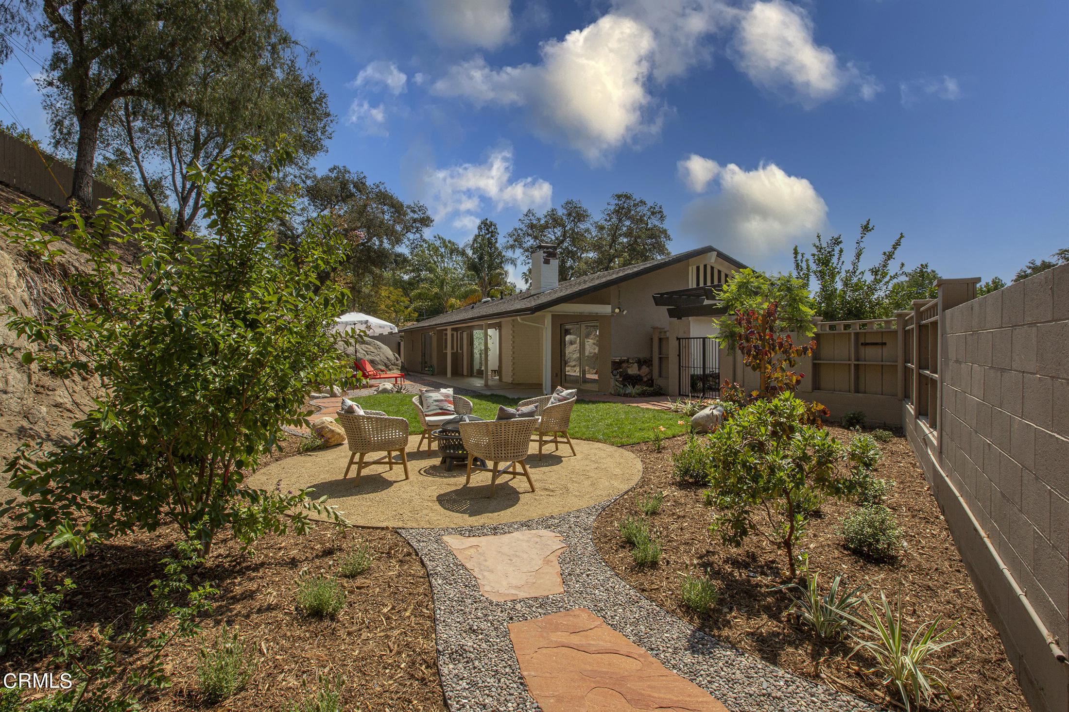 4175 Chevy Chase Drive La Canada Flintridge, CA 91011 - Photo 37 of 40 a view of a patio with table and chairs and potted plants