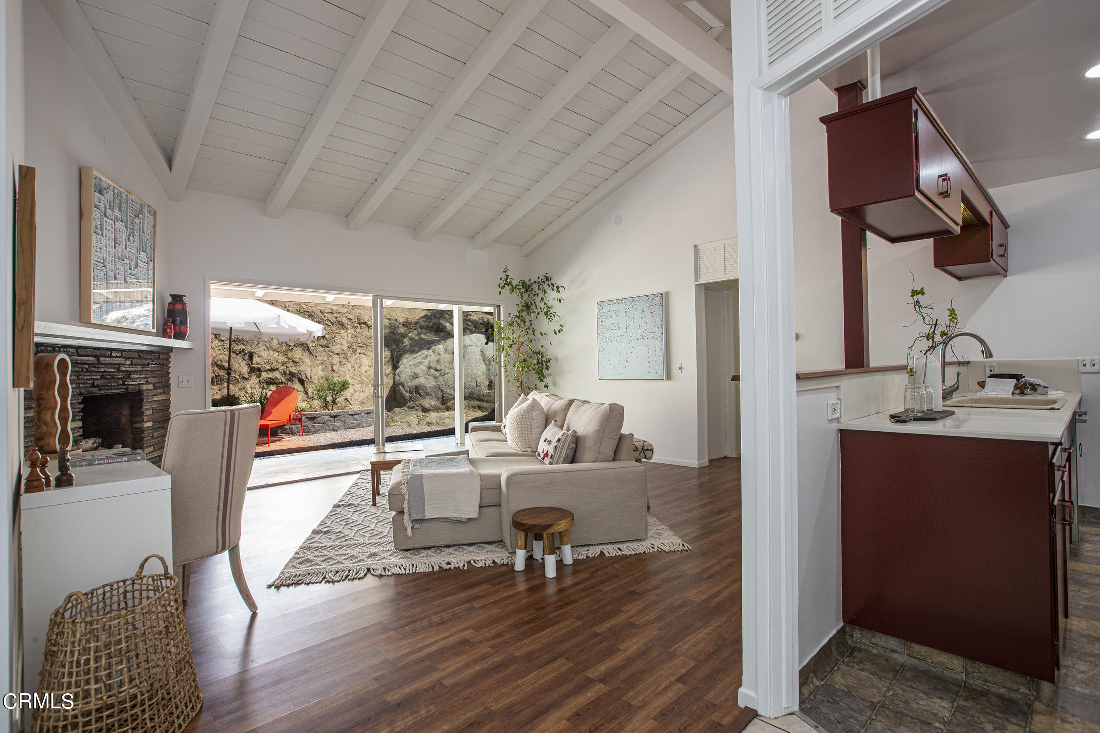 4175 Chevy Chase Drive La Canada Flintridge, CA 91011 - Photo 8 of 40 a living room with furniture and a fireplace