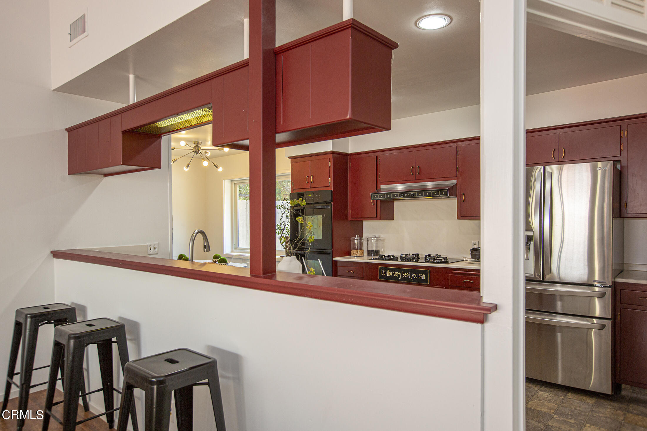 4175 Chevy Chase Drive La Canada Flintridge, CA 91011 - Photo 9 of 40 a kitchen with stainless steel appliances granite countertop a refrigerator and a stove