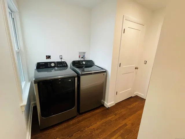 a stove top oven sitting inside of a kitchen