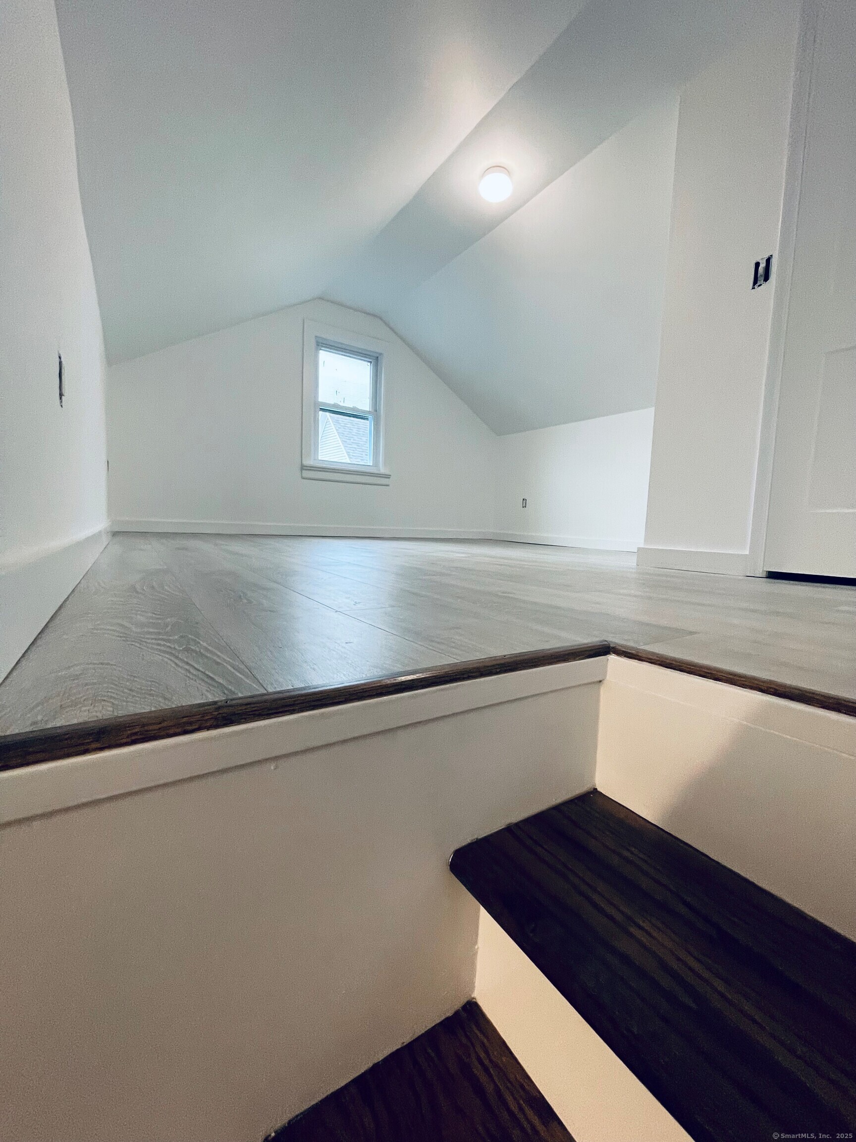 317 Strawberry Hill Avenue Norwalk, CT 06851 - Photo 26 of 30 a view of kitchen cabinets and wooden floor