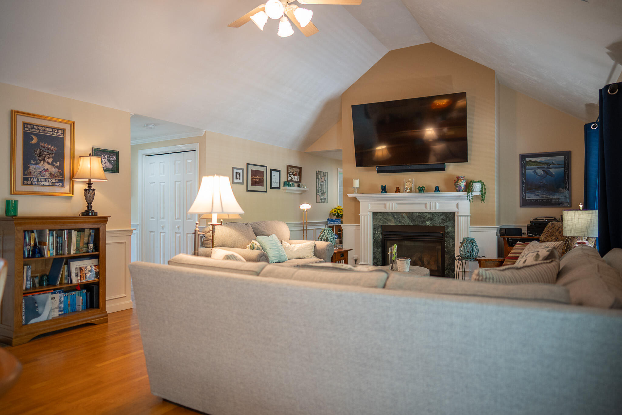 12 Sheffield Place Mashpee, MA 02649 - Photo 20 of 61 a living room with fireplace furniture and a flat screen tv