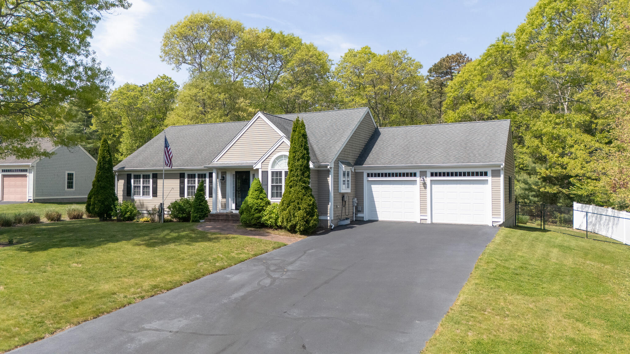 12 Sheffield Place Mashpee, MA 02649 - Photo 2 of 61 a view of a house with a yard and potted plants