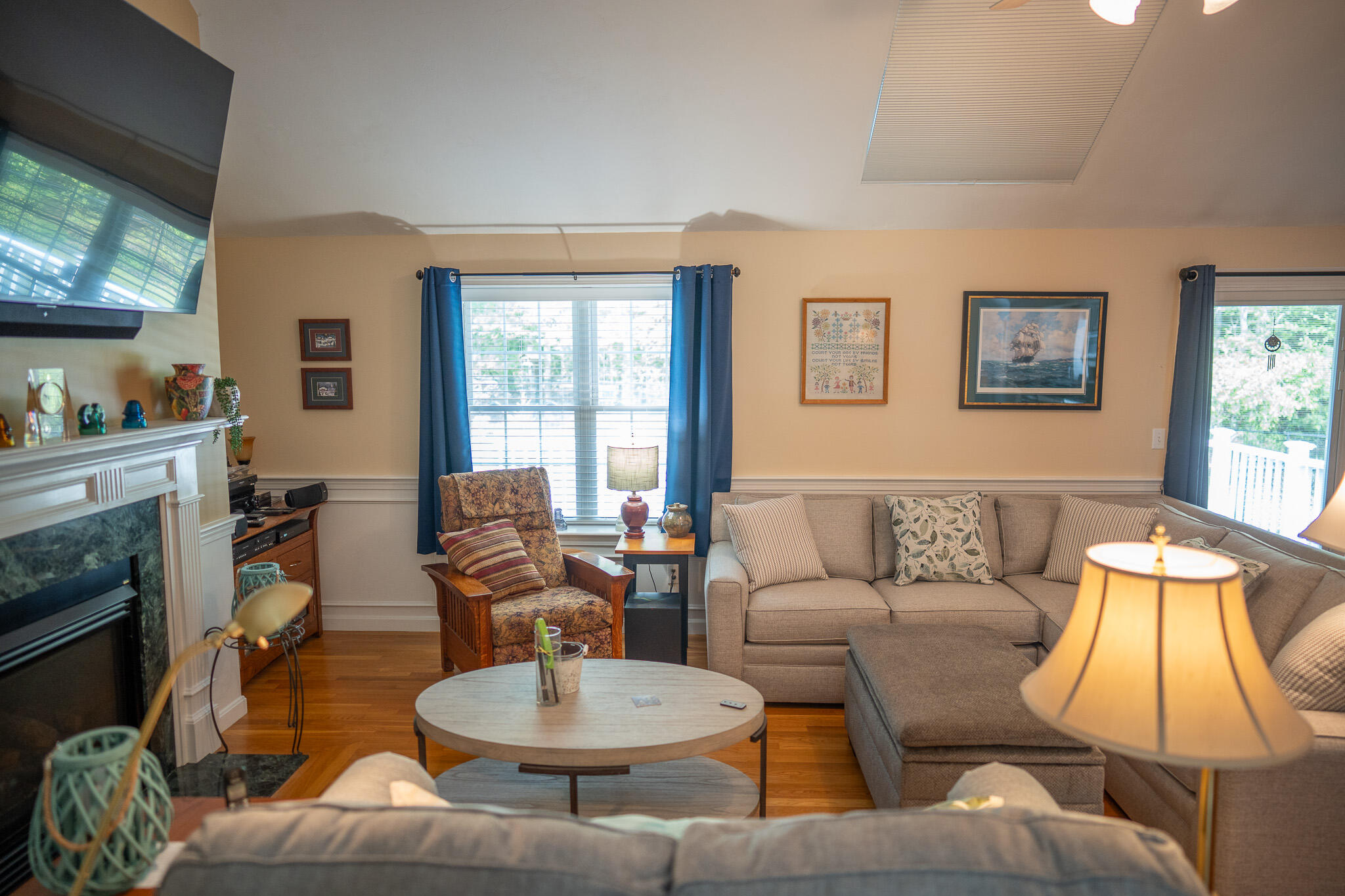 12 Sheffield Place Mashpee, MA 02649 - Photo 21 of 61 a living room with furniture and a fireplace