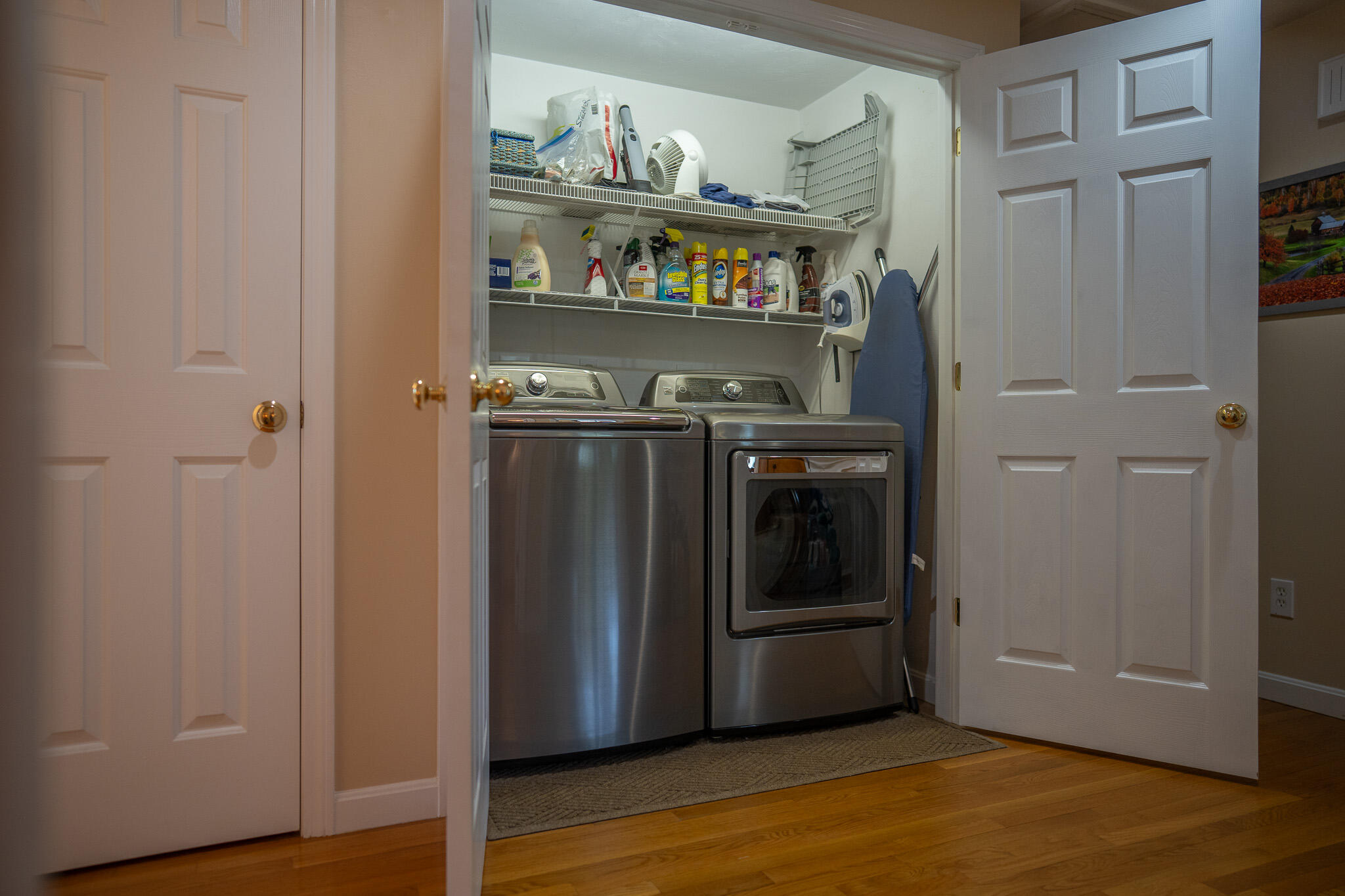 12 Sheffield Place Mashpee, MA 02649 - Photo 29 of 61 a view of a kitchen with fridge and wooden floor