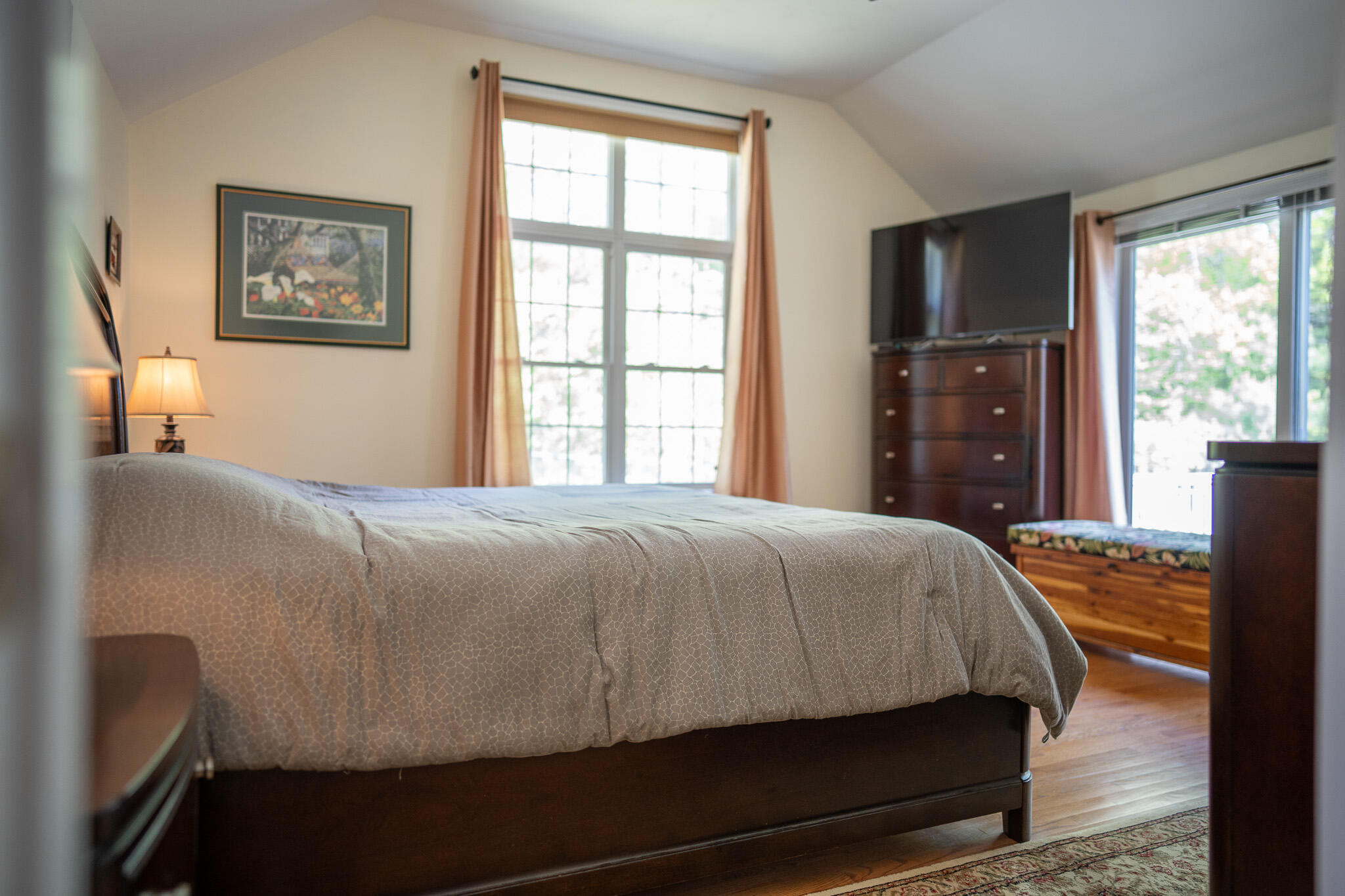 12 Sheffield Place Mashpee, MA 02649 - Photo 33 of 61 a bedroom with a bed two windows and a dresser