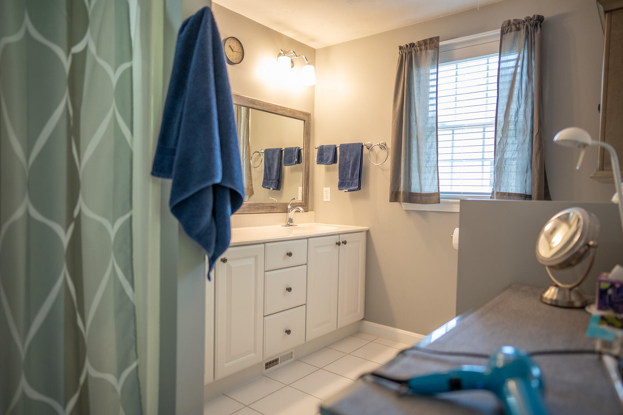 12 Sheffield Place Mashpee, MA 02649 - Photo 36 of 61 a bathroom with a sink and a mirror