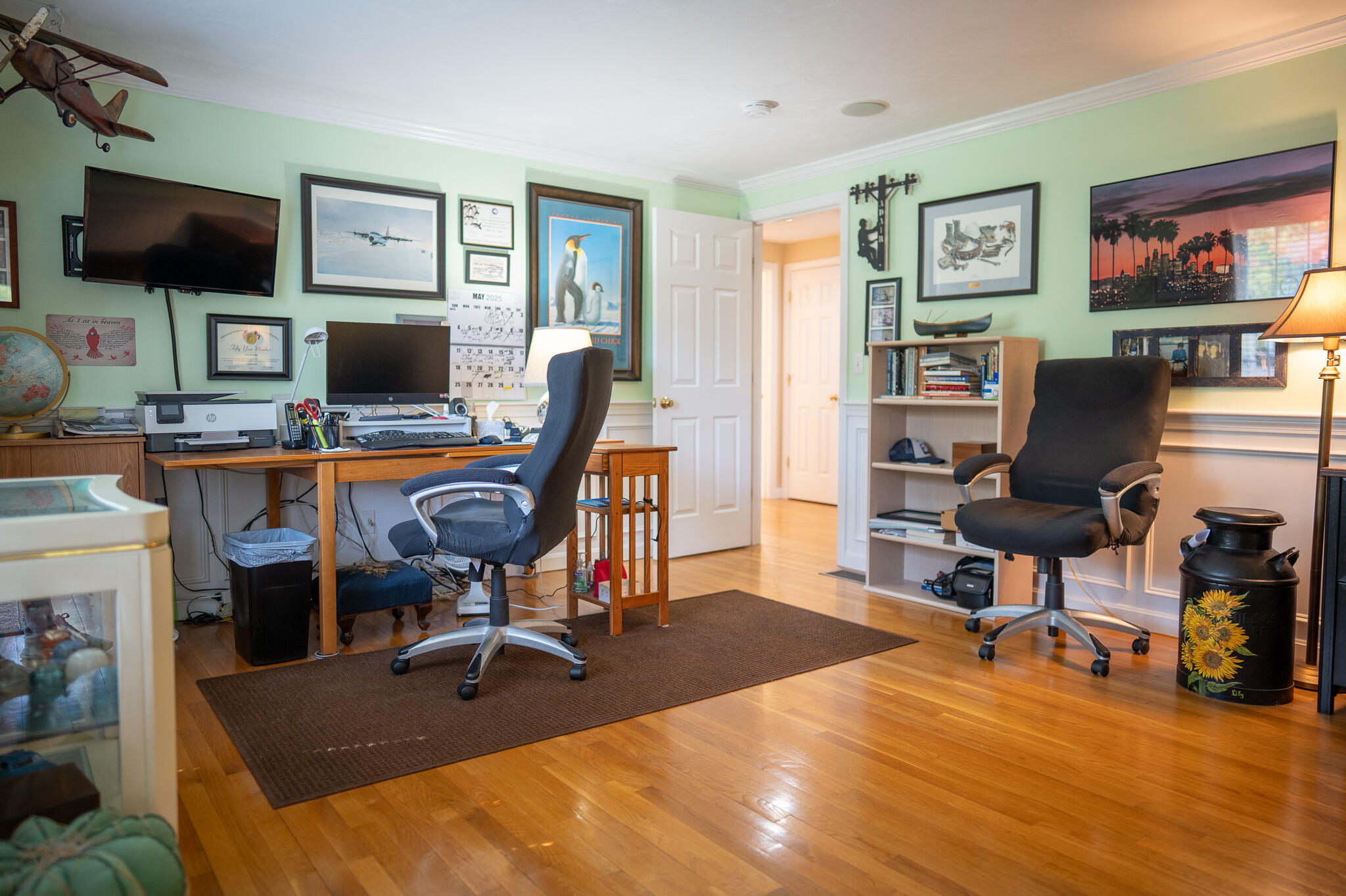 12 Sheffield Place Mashpee, MA 02649 - Photo 39 of 61 a view of a workspace with furniture and a flat screen tv