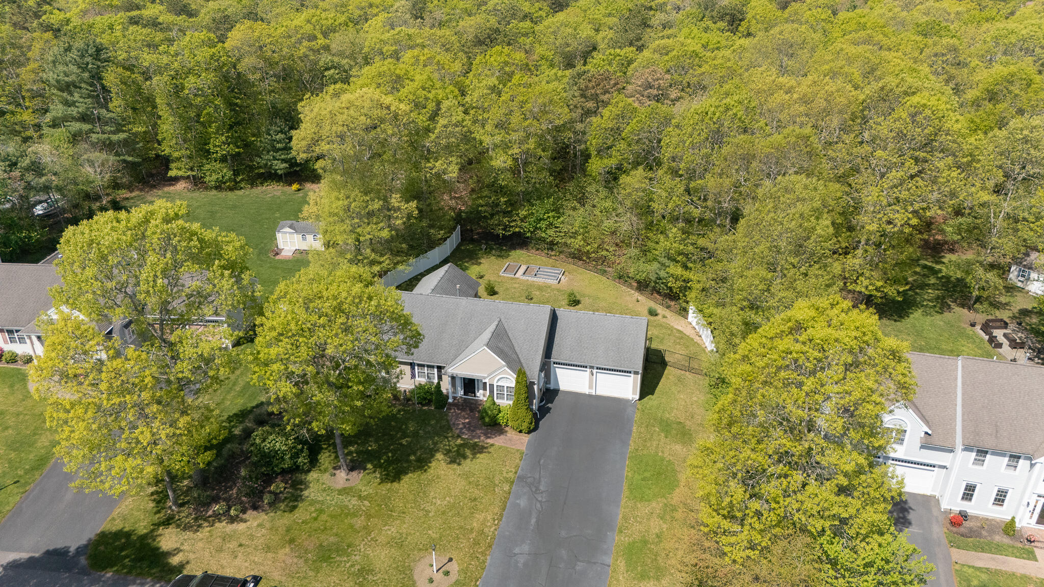 12 Sheffield Place Mashpee, MA 02649 - Photo 4 of 61 view of a house with a yard