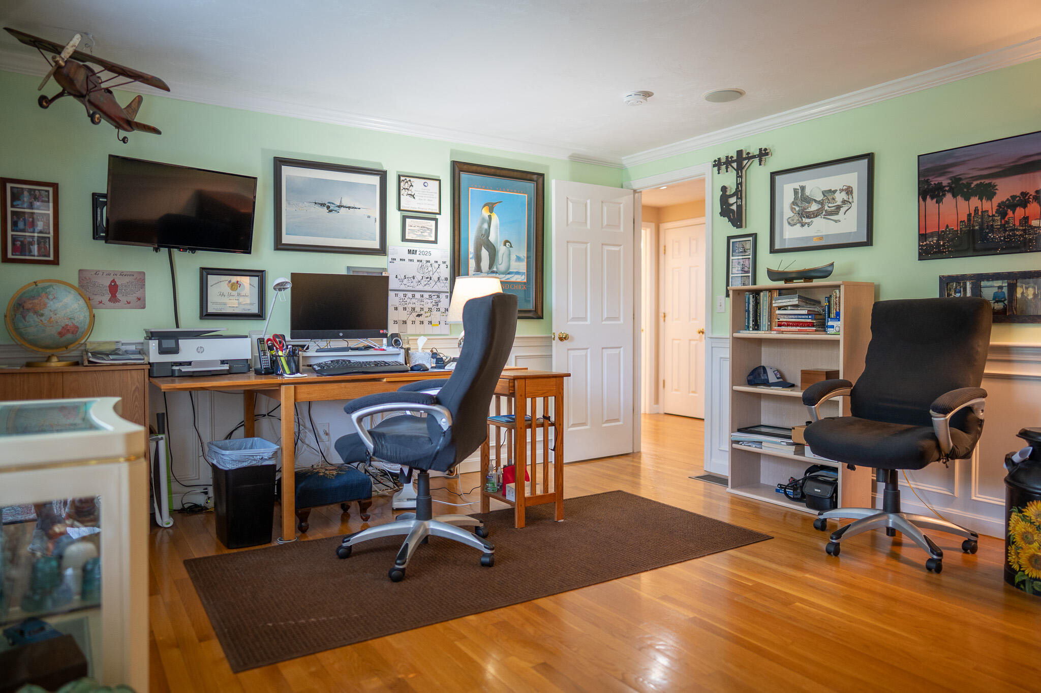 12 Sheffield Place Mashpee, MA 02649 - Photo 43 of 61 a view of a workspace with furniture and a flat screen tv