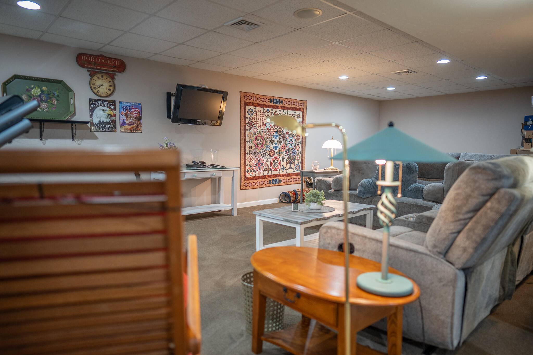 12 Sheffield Place Mashpee, MA 02649 - Photo 45 of 61 a living room with furniture a flat screen tv and kitchen view