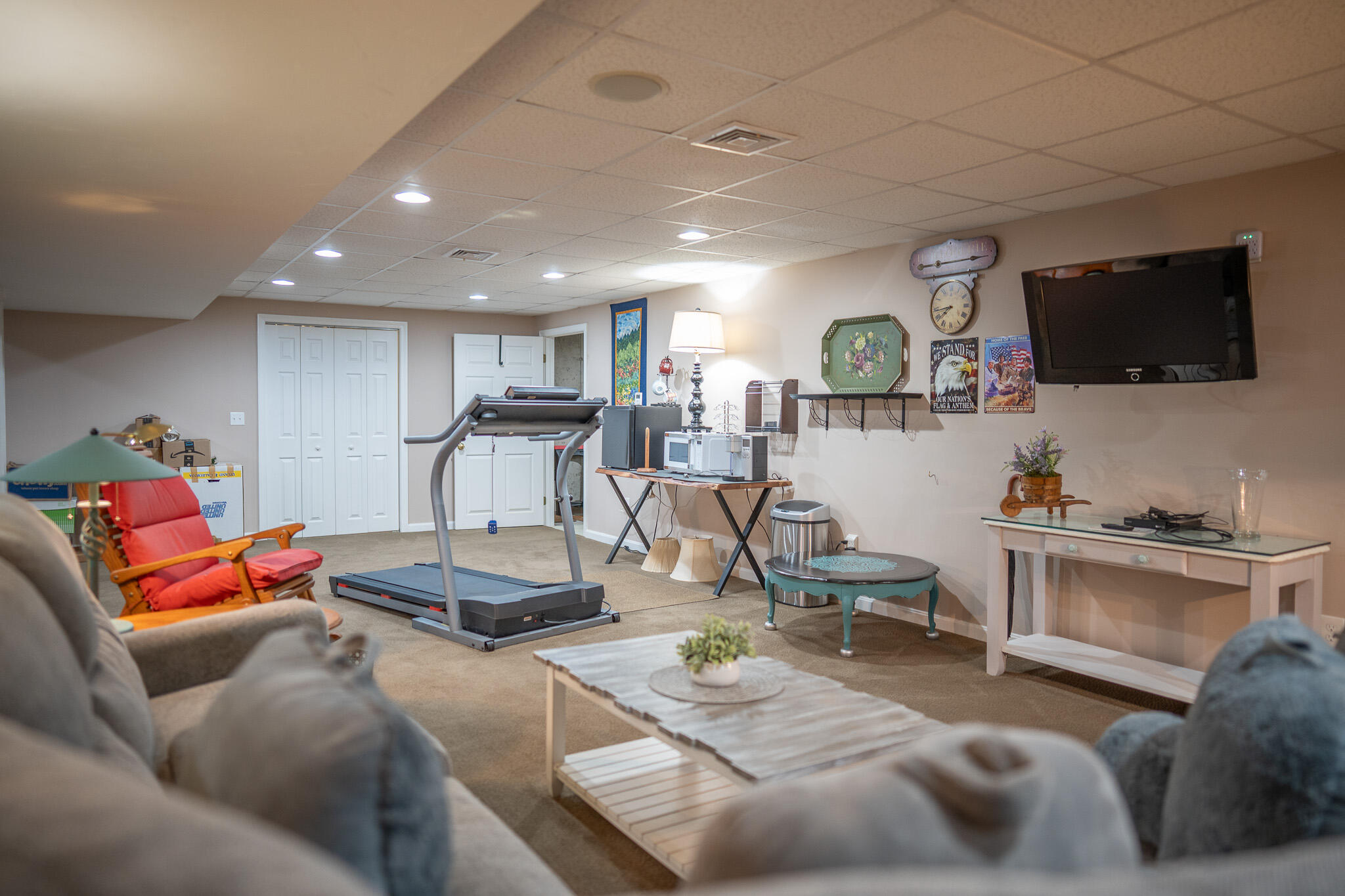 12 Sheffield Place Mashpee, MA 02649 - Photo 46 of 61 a living room with furniture and a flat screen tv