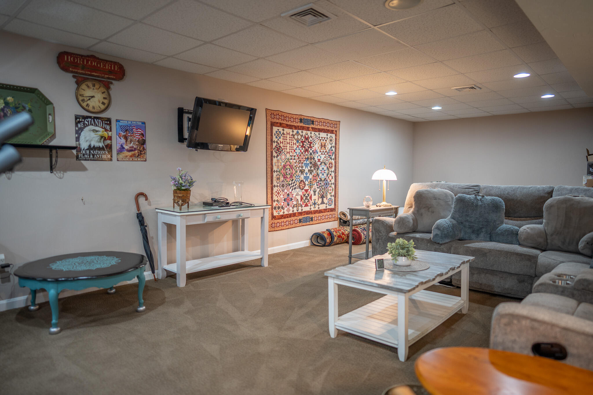 12 Sheffield Place Mashpee, MA 02649 - Photo 48 of 61 a living room with furniture and a flat screen tv