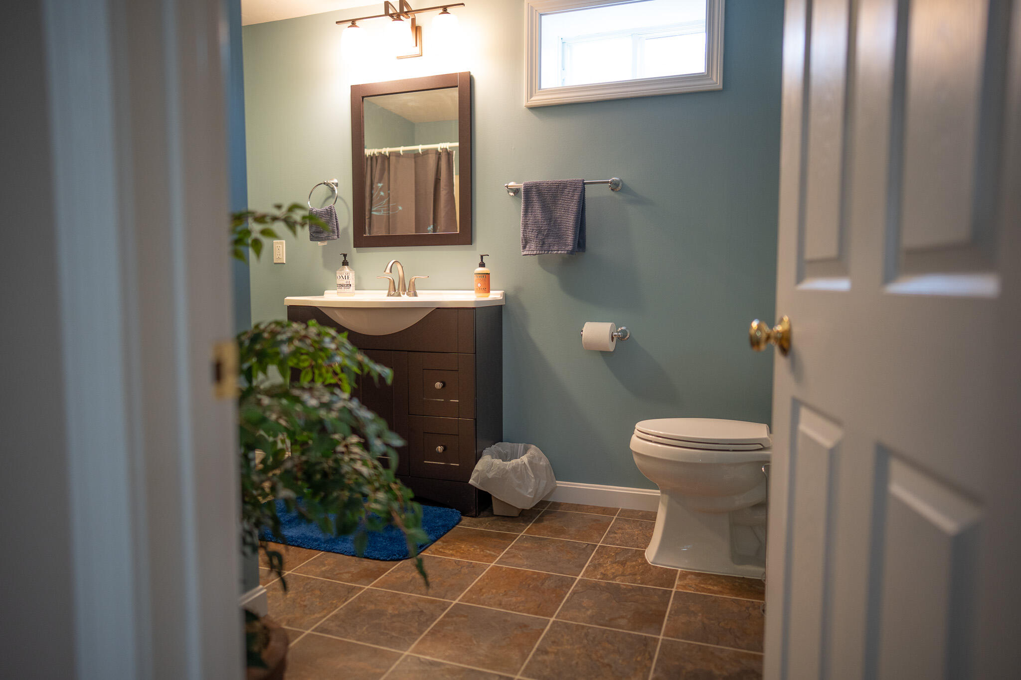 12 Sheffield Place Mashpee, MA 02649 - Photo 49 of 61 a bathroom with a toilet sink and mirror