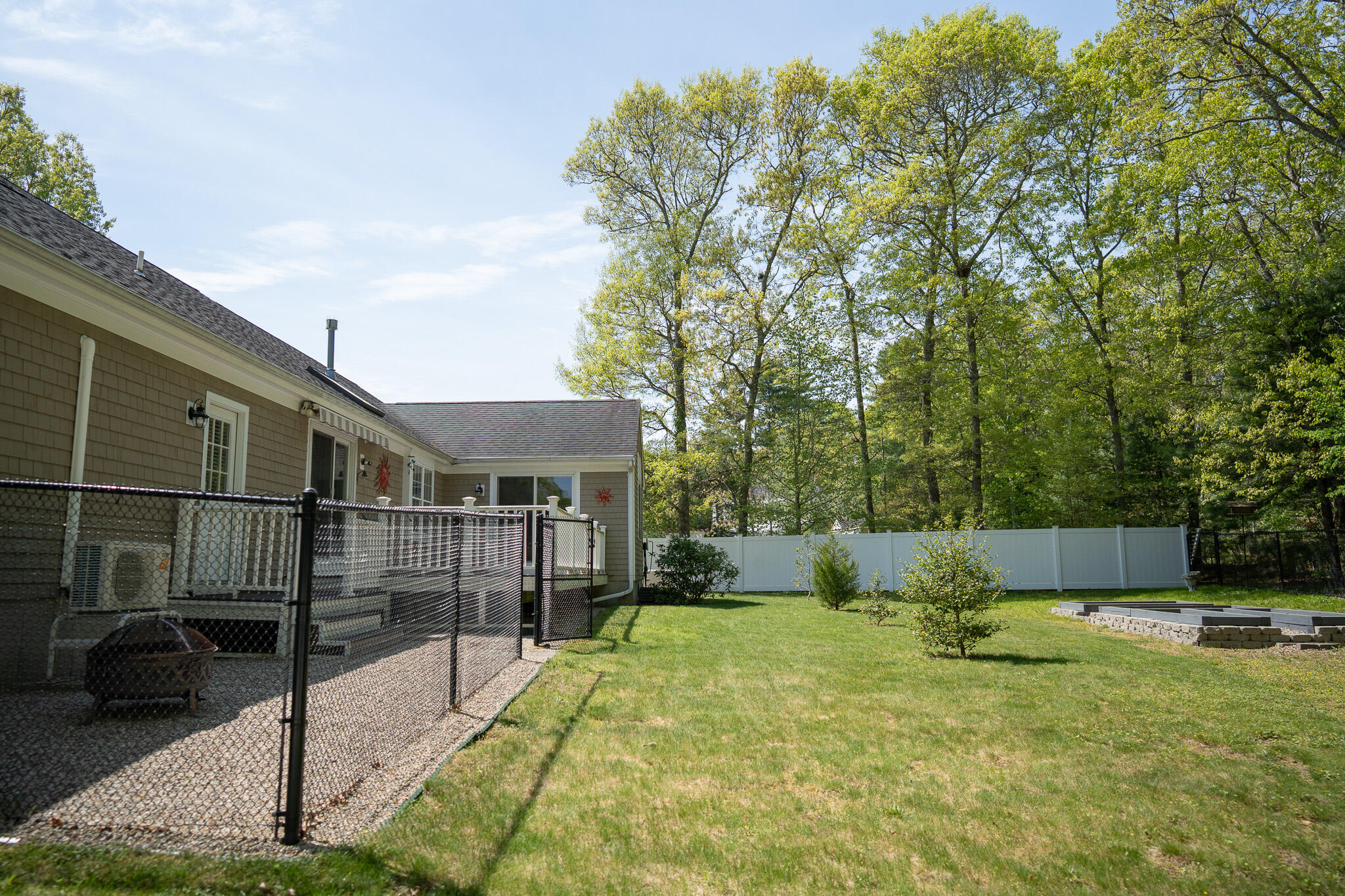 12 Sheffield Place Mashpee, MA 02649 - Photo 54 of 61 a view of a backyard