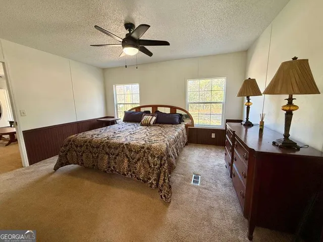 a living room with a toilet