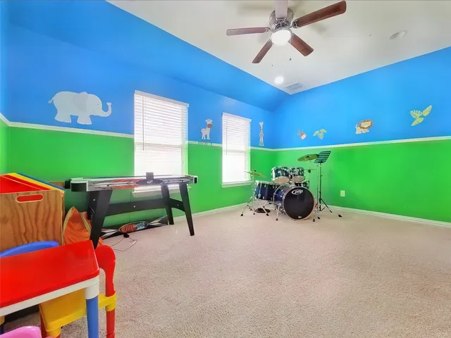 a room with games and windows