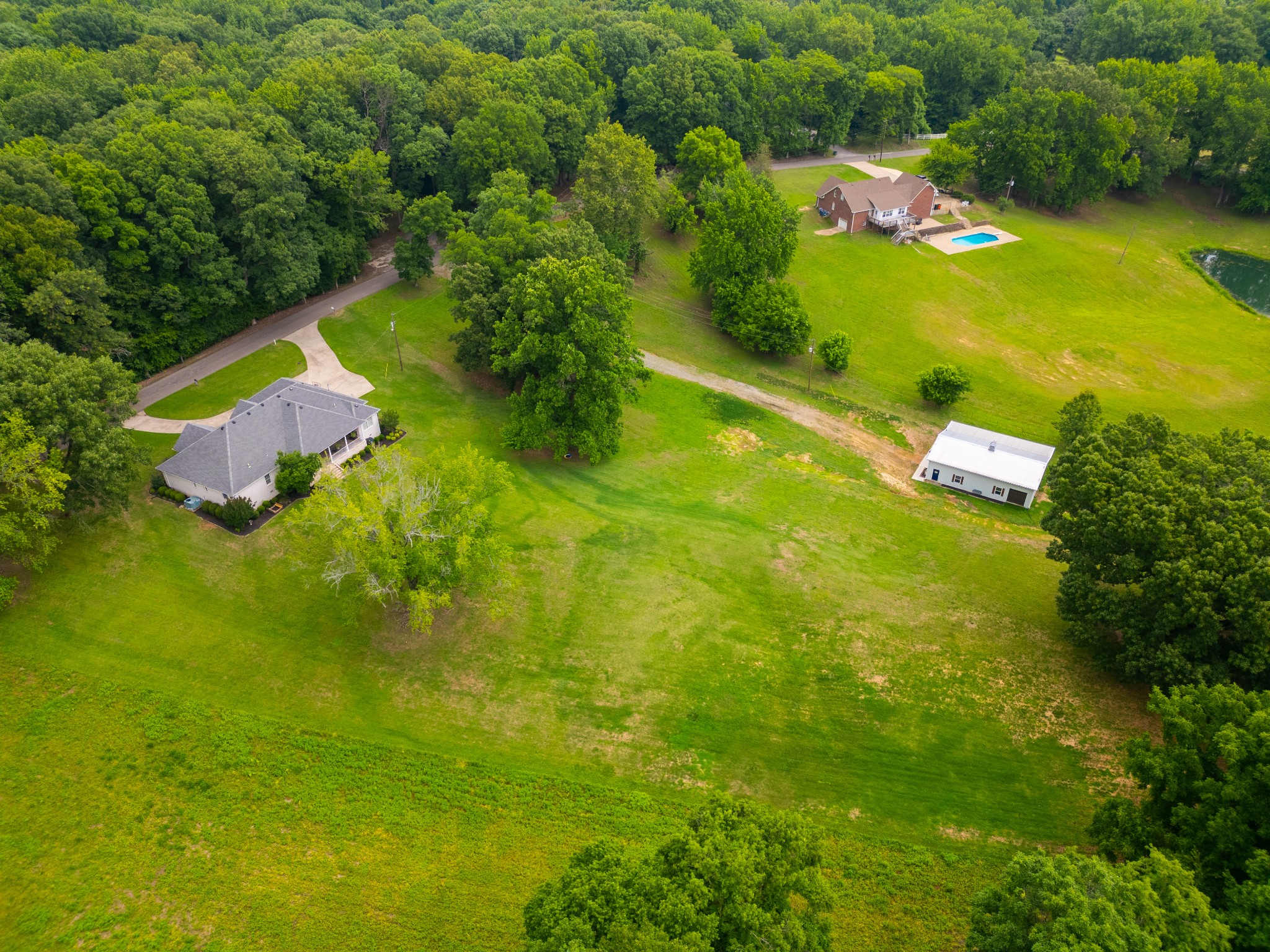 1015 Kelly Road Dyersburg, TN 38024 - Photo 35 of 41 a aerial view of a house with a yard