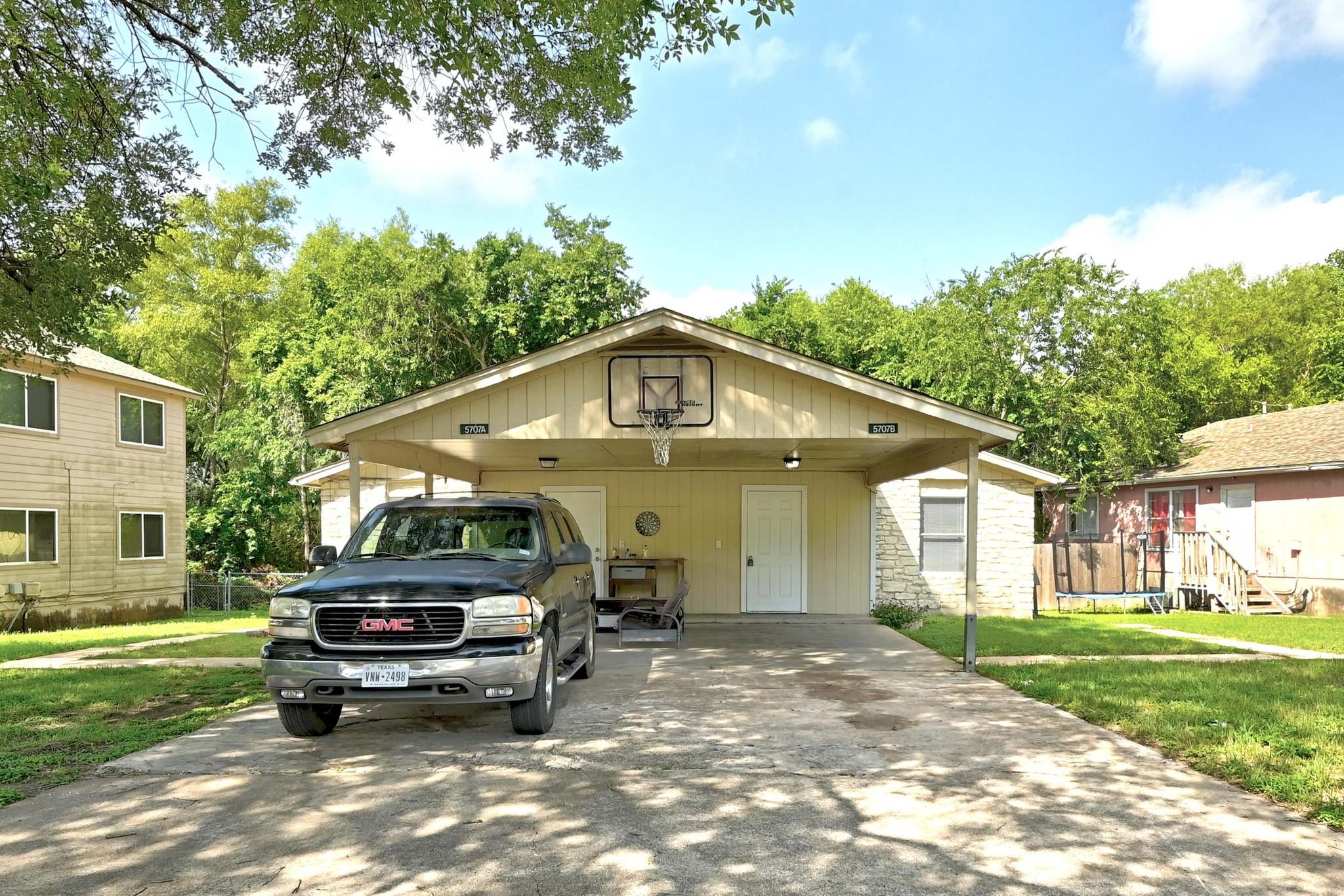 5707 Spring Meadow Road Austin, TX 78744 - Photo 3 of 21 a house view with a garden space
