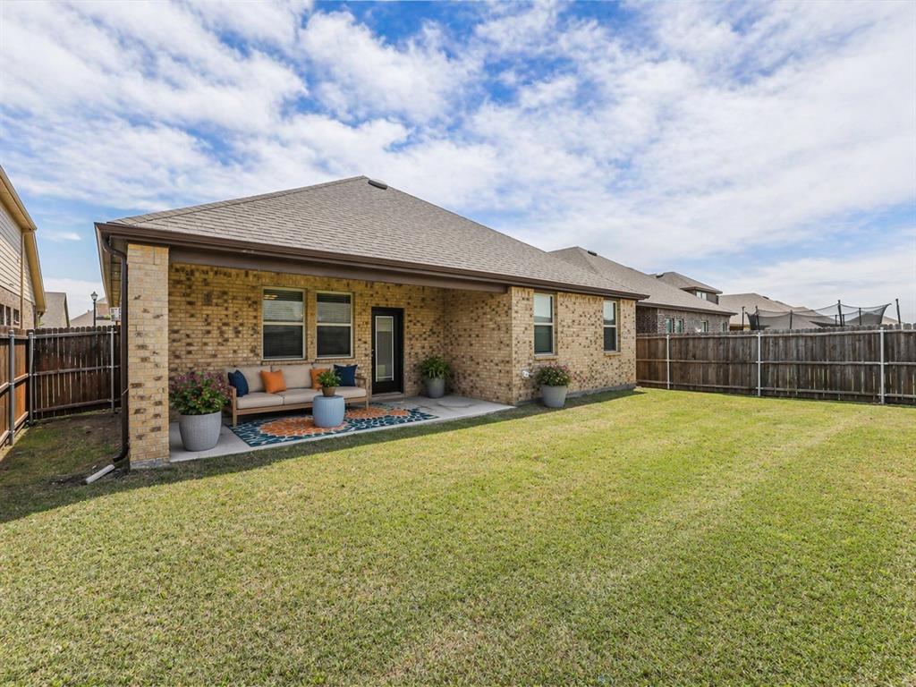 3024 Meredith Lane Forney, TX 75126 - Photo 23 of 29 Expansive grassy yard with a fenced perimeter
