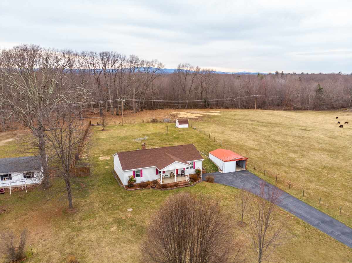 4233 Cold Springs Road Raphine, VA 24472 - Photo 49 of 50 an aerial view of a house with swimming pool and a yard