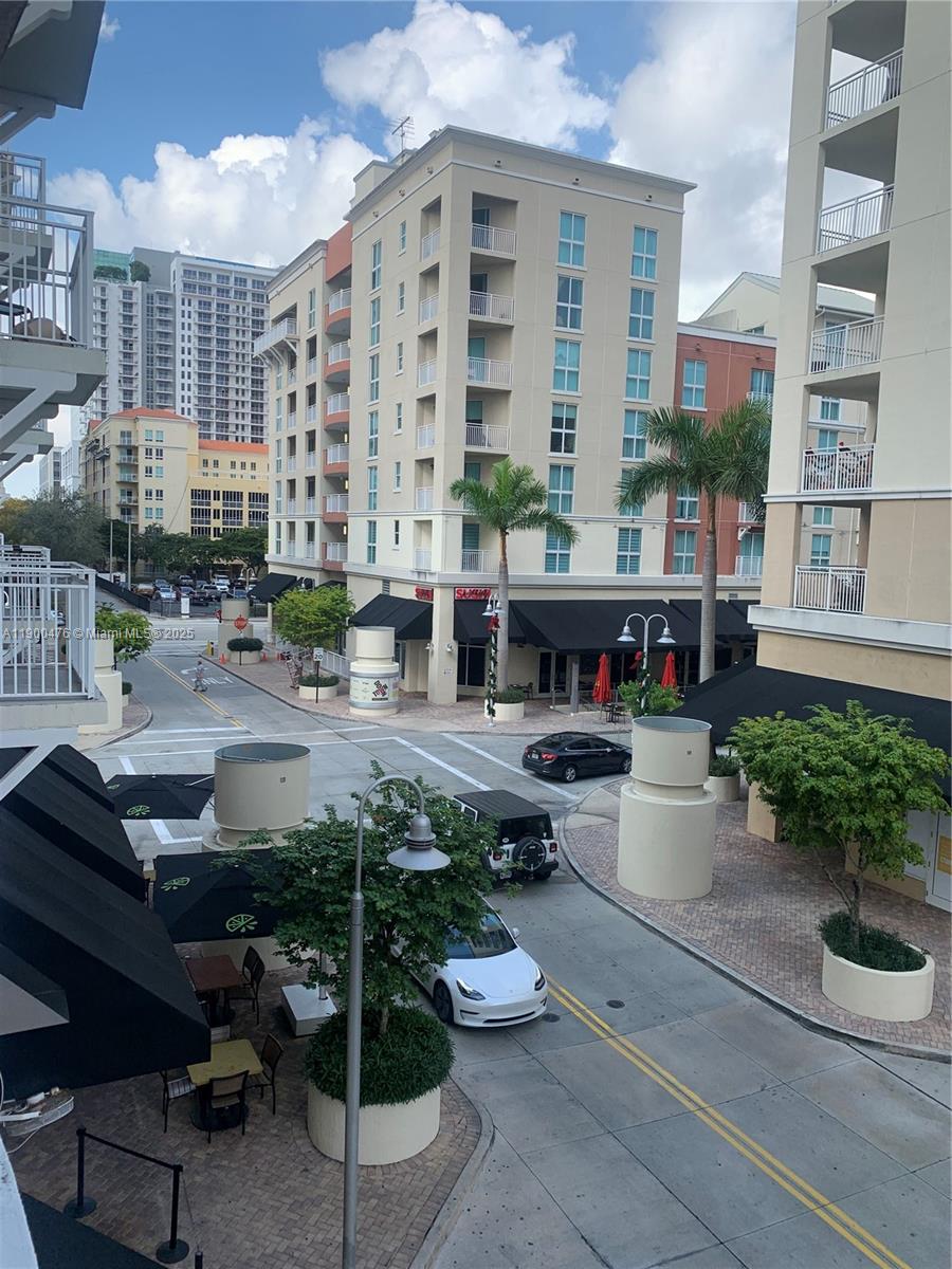 a view of building with outdoor seating