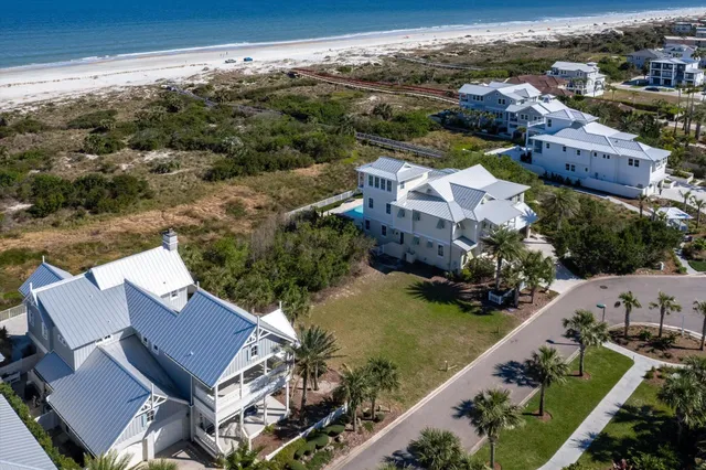 an aerial view of a house with a garden