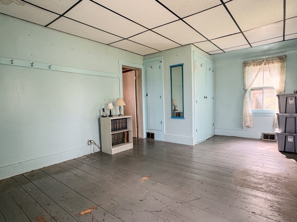 294 Capt Beers Plain Road Northfield, MA 01360 - Photo 15 of 41 a view of empty room with wooden floor