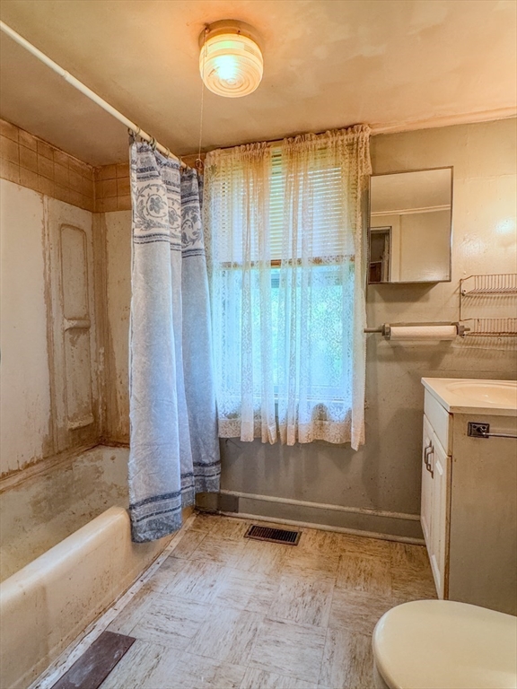 294 Capt Beers Plain Road Northfield, MA 01360 - Photo 16 of 41 a bathroom with a granite countertop sink mirror vanity and toilet