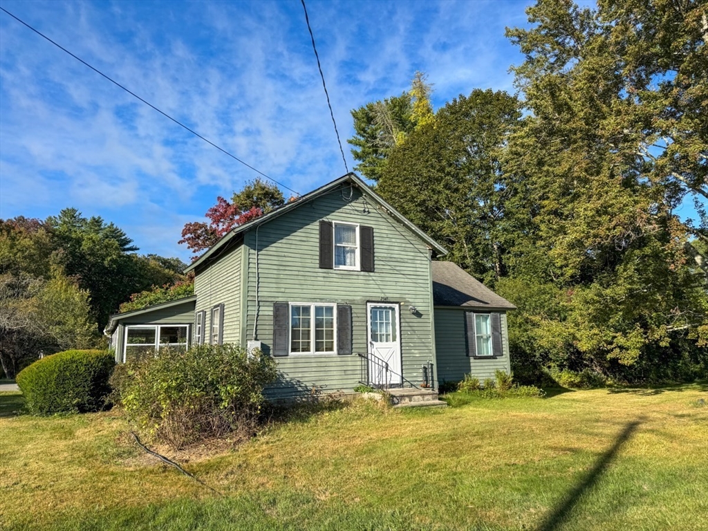 294 Capt Beers Plain Road Northfield, MA 01360 - Photo 3 of 41 a front view of a house with a garden