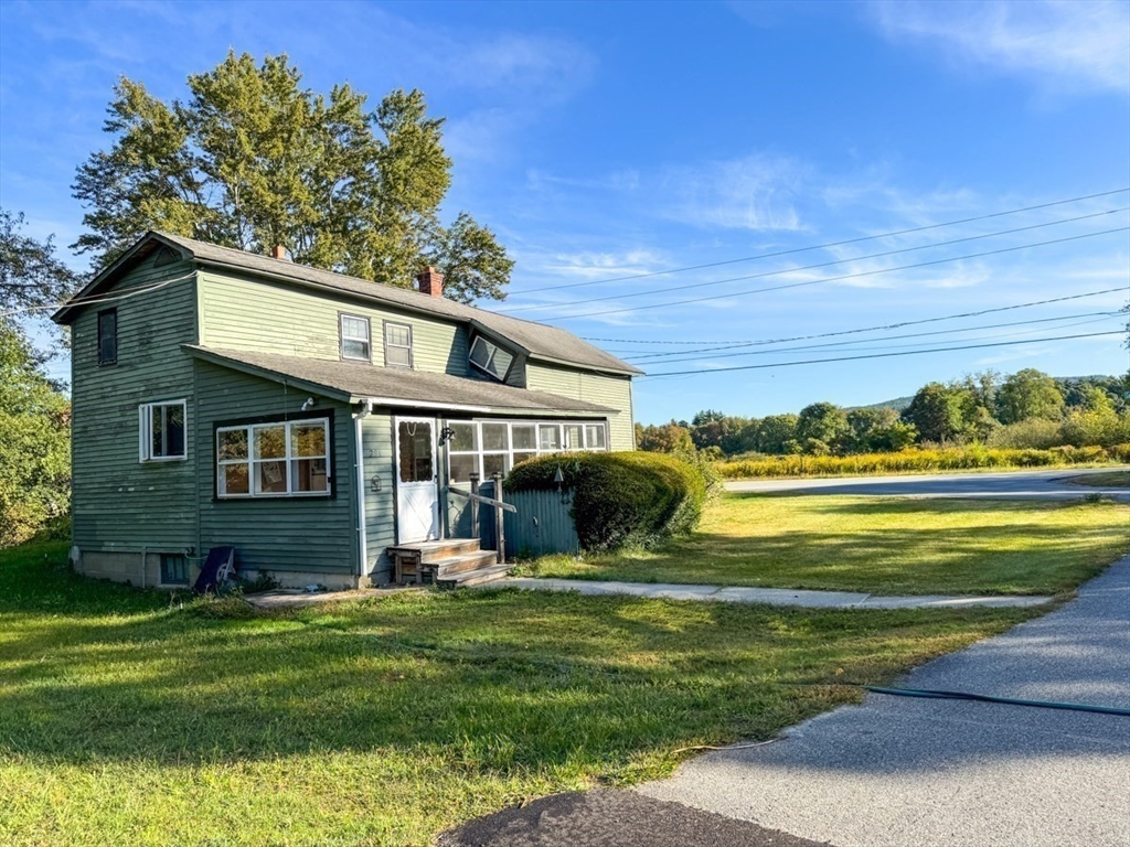294 Capt Beers Plain Road Northfield, MA 01360 - Photo 33 of 41 a front view of a house with a garden