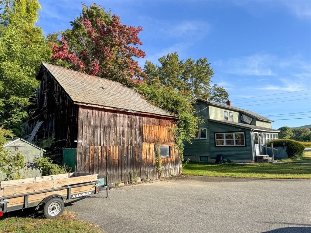 294 Capt Beers Plain Road Northfield, MA 01360 - Photo 36 of 41 a car parked in front of a house