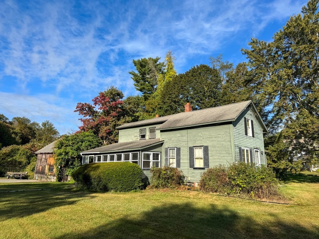 294 Capt Beers Plain Road Northfield, MA 01360 - Photo 5 of 41 a front view of a house with a yard