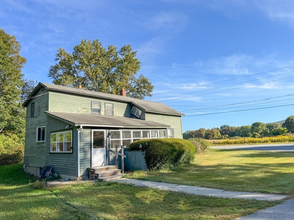 294 Capt Beers Plain Road Northfield, MA 01360 - Photo 6 of 41 a front view of house with yard and seating area