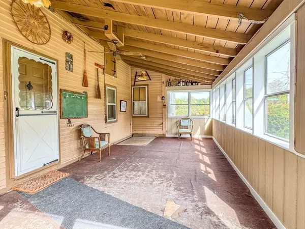 a view of a large room with a large window