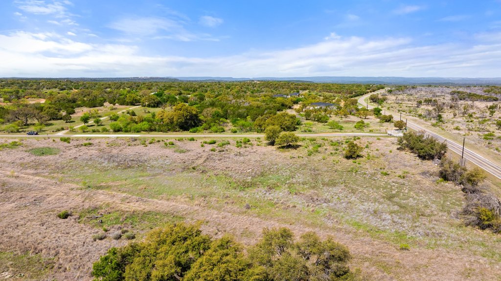 9580 Smith West Ranch Road Round Mountain, TX 78663 - Photo 18 of 26 a view of beach and city