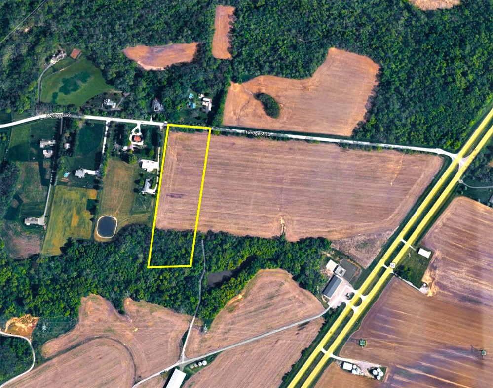 1 Hedges Road Xenia, OH 45385 - Photo 1 of 9 This aerial view showcases a spacious lot with vast potential amidst a serene landscape.