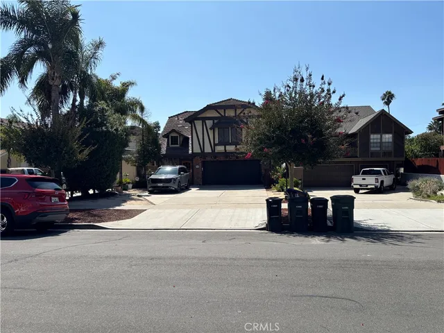 a view of street with parked cars