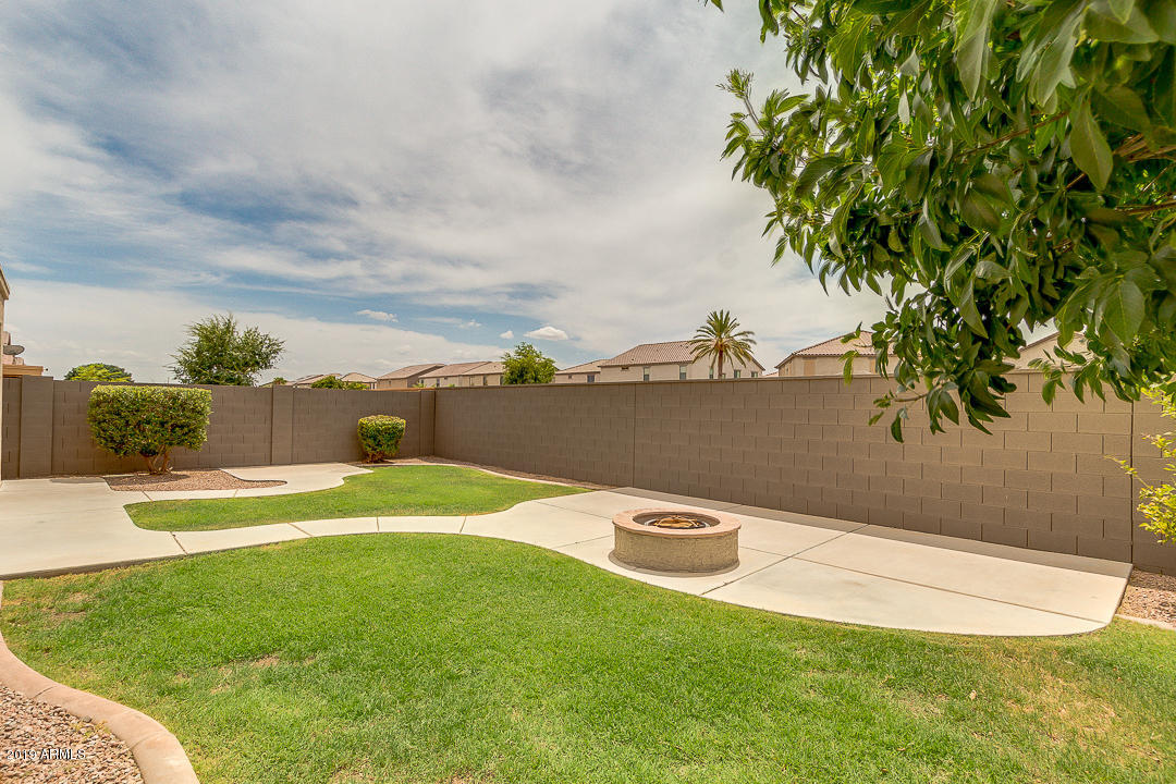 19216 North Lariat Road Maricopa, AZ 85138 - Photo 37 of 40 a view of swimming pool with a yard