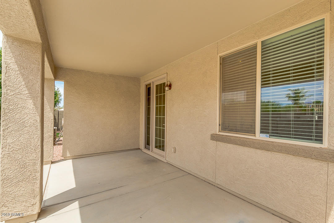 19216 North Lariat Road Maricopa, AZ 85138 - Photo 39 of 40 a view of an empty room with a window