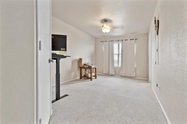 a view of a livingroom with a flat screen tv