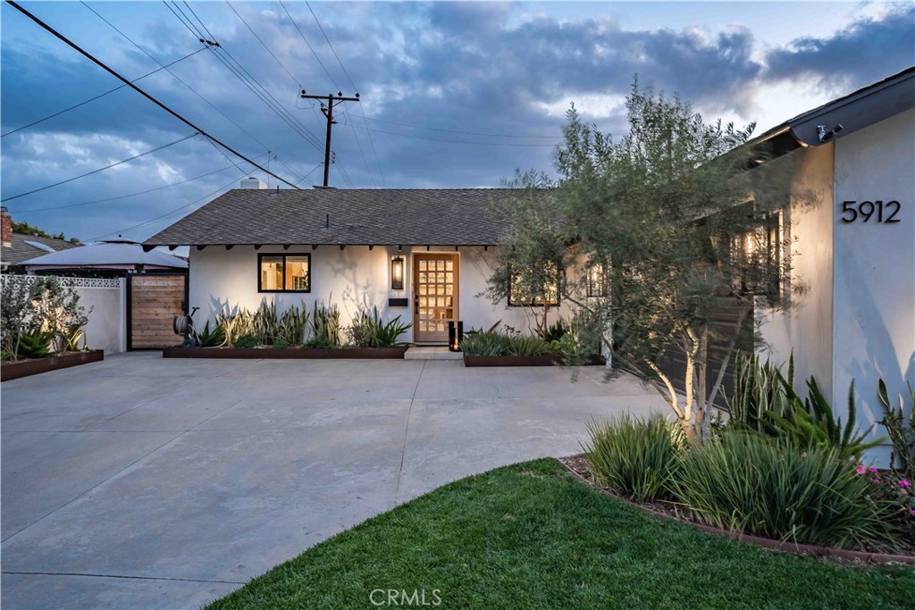 5912 Raphael Drive Huntington Beach, CA 92649 - Photo 1 of 1 a view of a house with a street