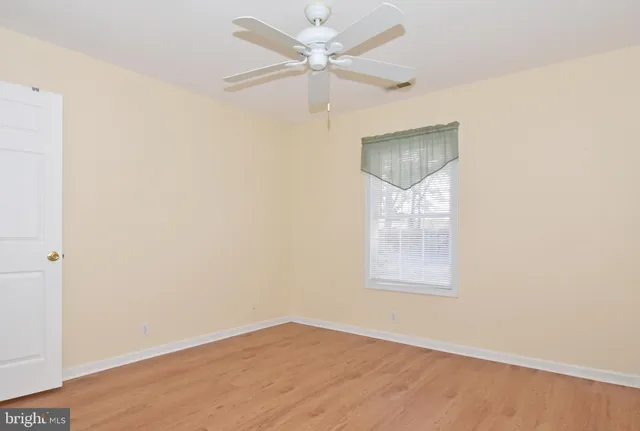 a bathroom with a shower and a toilet