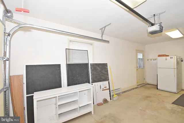 a view of a livingroom with a furniture and staircase