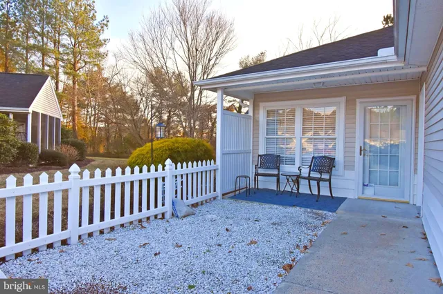 a view of a porch with seating space