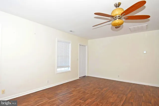 a view of an empty room with window